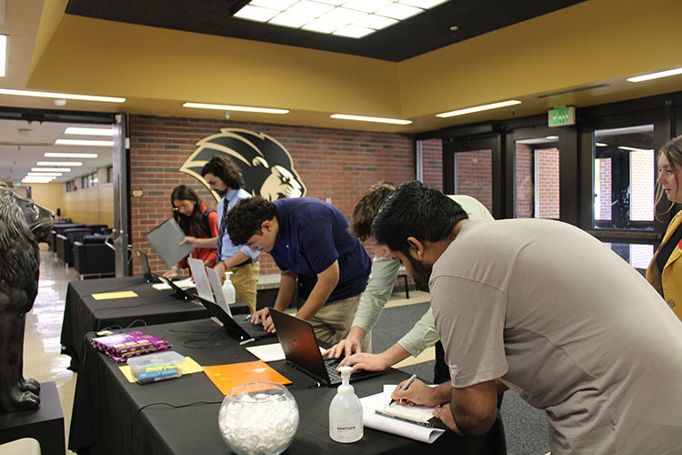 Students check in during a STEM Career Fair