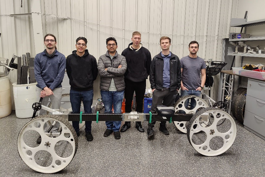 Students next to their NASA rover