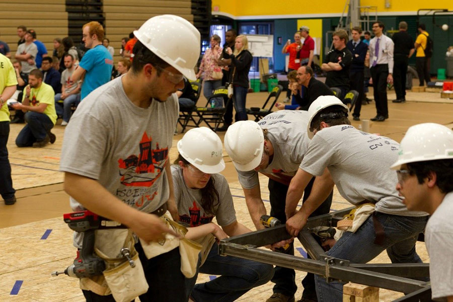 Students participate in a steel bridge competition