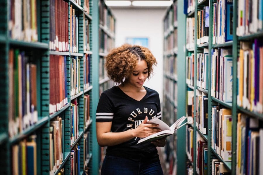 Student in library is pictured.