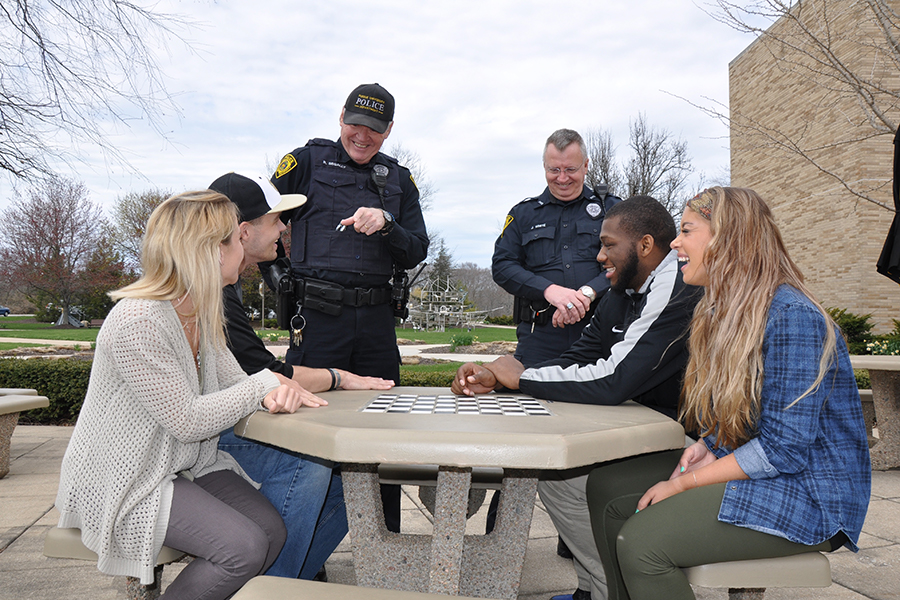 Police talking with PNW students