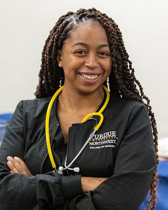 A PNW Nursing student wears a stethoscope