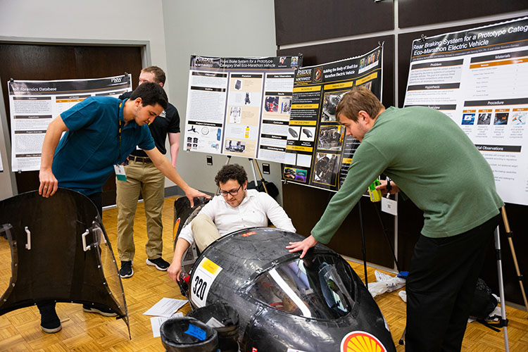 Students display their project vehicle