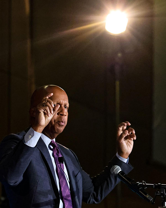 Bryan Stevenson speaking on stage