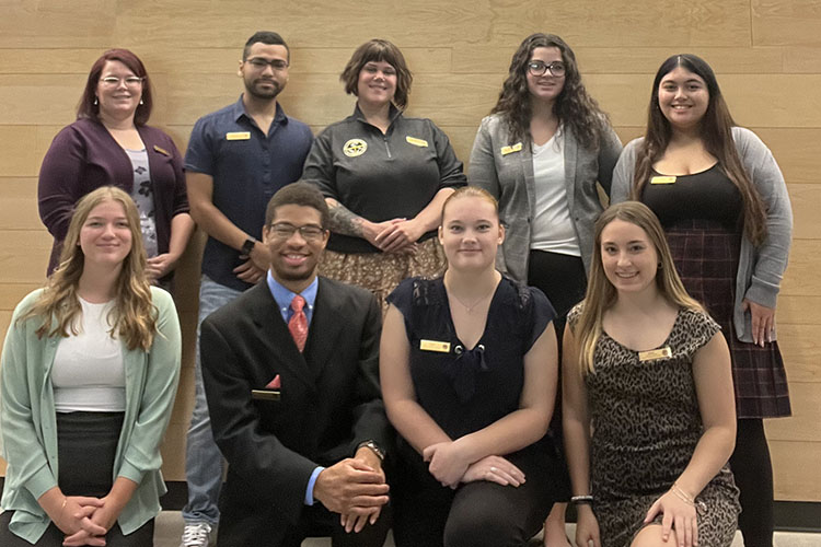 Members of student government stand together in a group