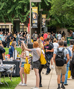Students gather outdoors for a welcome rally on the Hammond campus