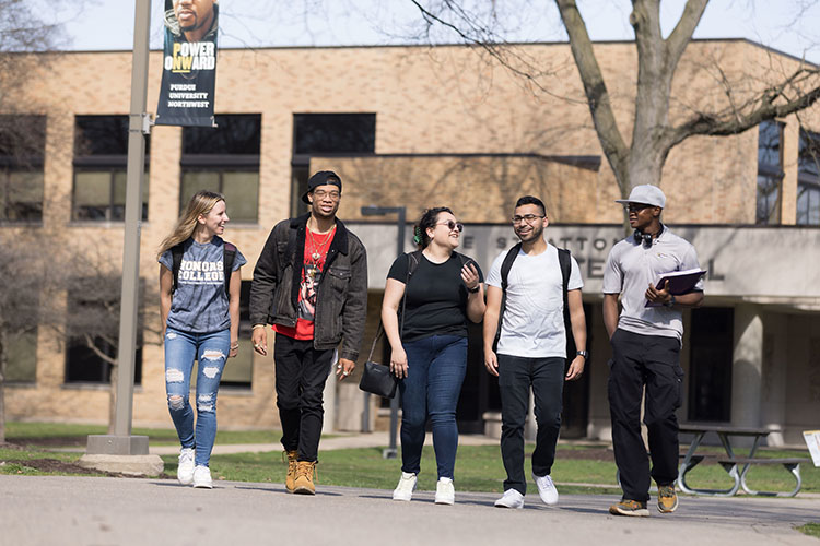 PNW students walk across campus