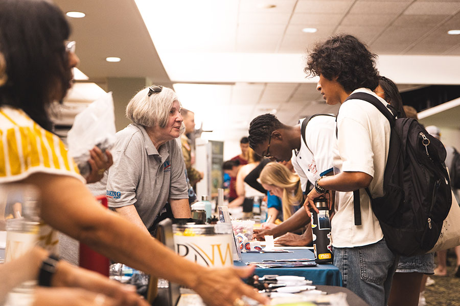 Students visit tables during the Hammond Welcome Rally