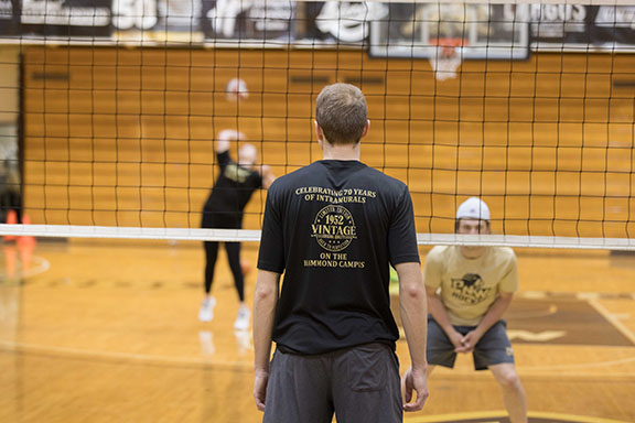 Students play volleyball