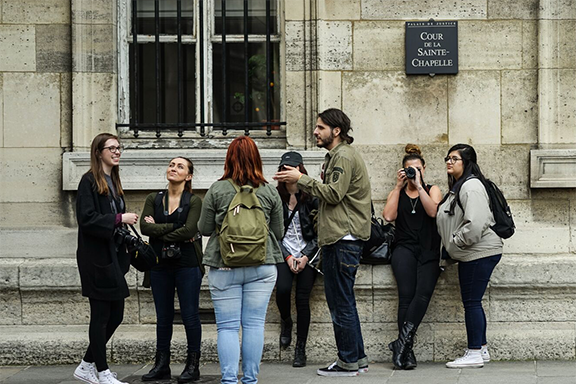 PNW students stand on a street outdoors in France