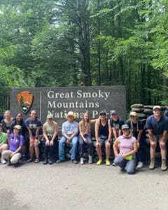Students in front of a Great Smoky Mountains National Park sign