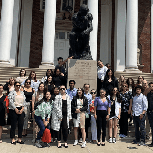 A group of students, faculty, and staff stand together during a study away trip in Tennessee