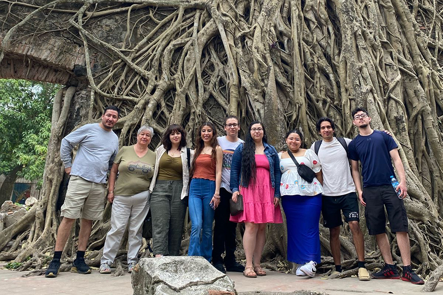 Study Away in Mexico - 9 students standing in front of a tree in Mexico
