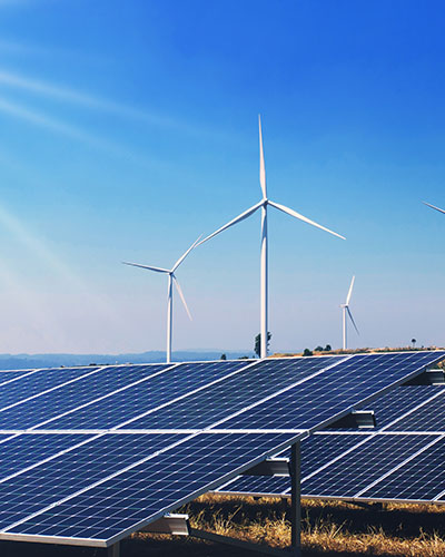 Solar panels and a wind farm
