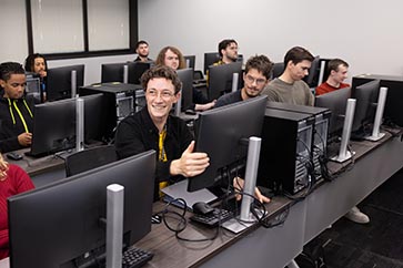 Room full of PNW students working on the computers in a computer lab