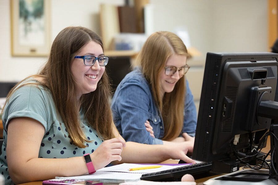 Students work in a computer lab