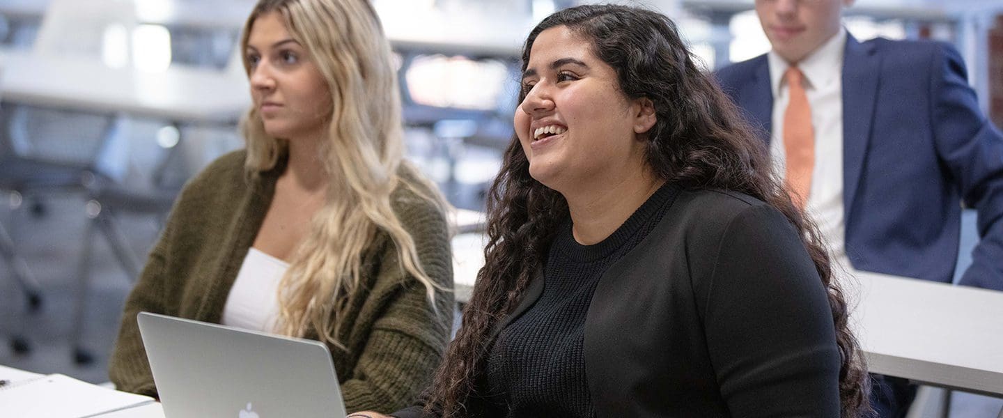 Two female smiling students