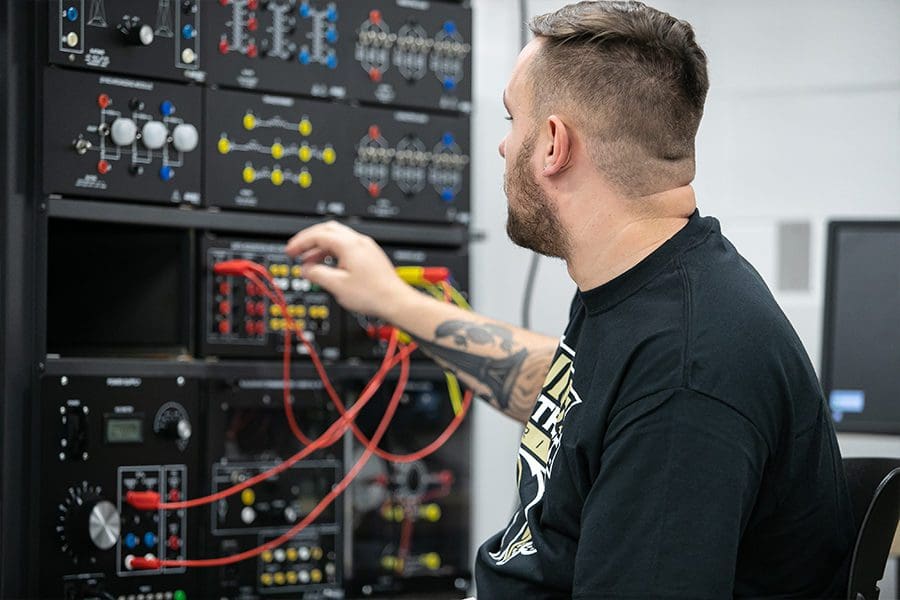 Student working with equipment