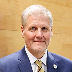 Professional headshot: Jon Swarts