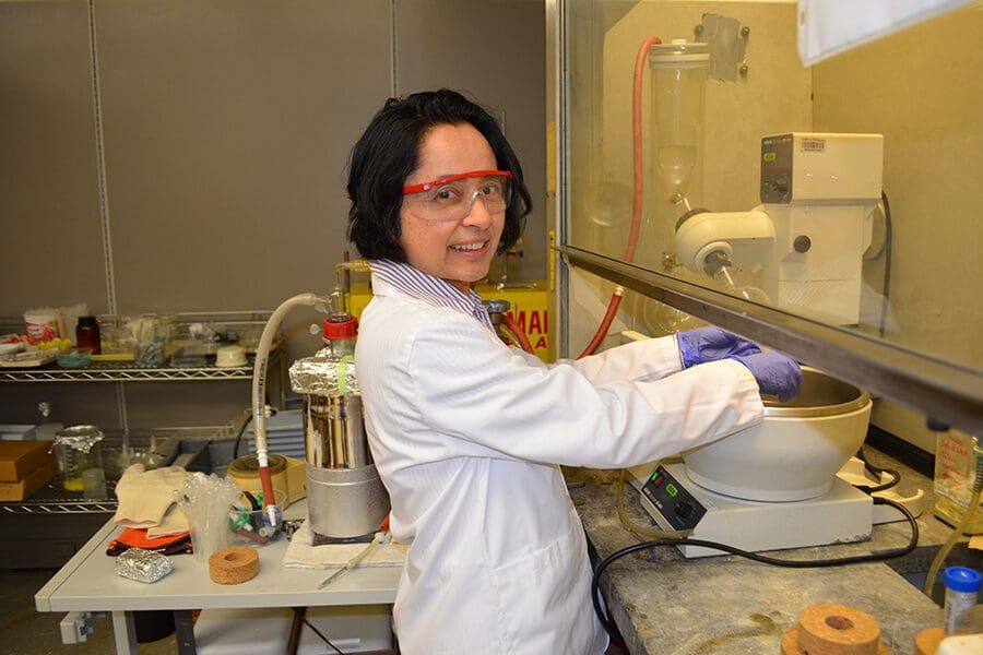 Meden Isaac-Lam working in a lab
