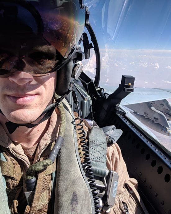 john tonkovich in the cockpit of a F/A-18 Super Hornet with sky in background