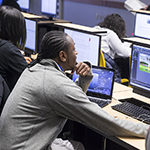 A student works in a computer lab