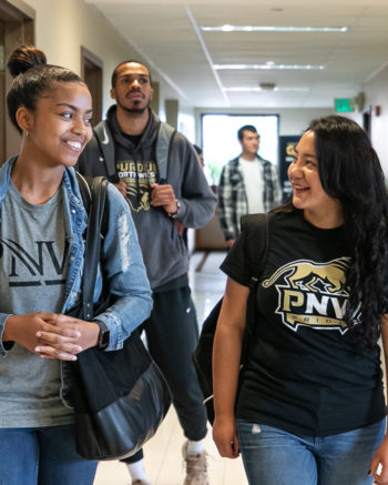 Students walk through the halls of PNW