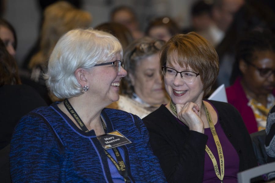 Guests Conversing at Founders Day Event