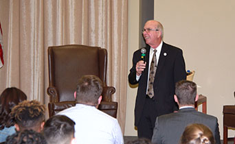 Chancellor Thomas Keon talks to an audience