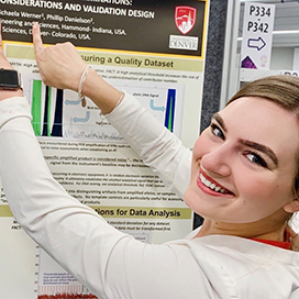 Michaela Werner pointing at research. 