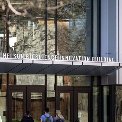 Students walk into PNW's Nils K. Nelson Bioscience Innovation Building