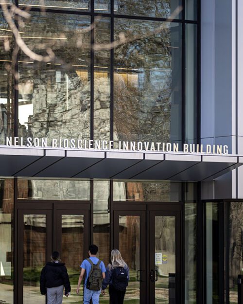 Students walk into PNW's Nils K. Nelson Bioscience Innovation Building