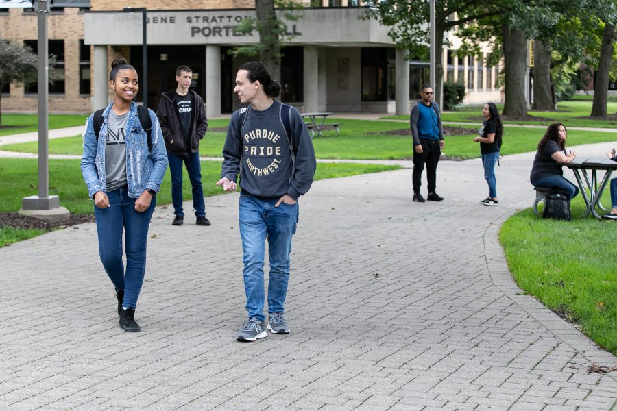Students walk through founders plaza