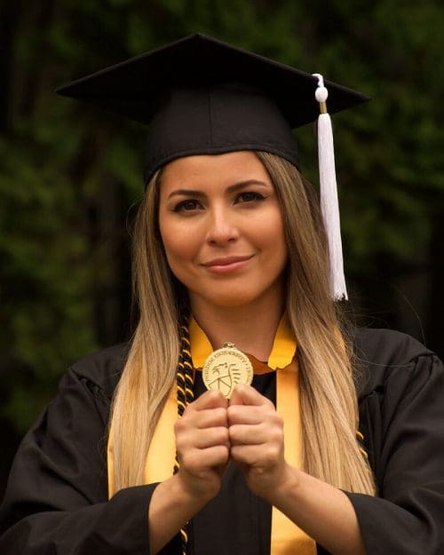 amy nieves with medallion is pictured