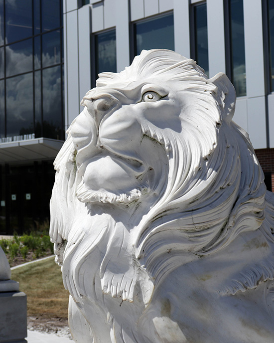 A lion sculpture outside PNW's Nils K Nelson Bioscience Innovation Building