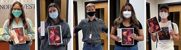 Winners of the PNW Roaring Ahead Scavenger Hunt pose with their prize. From left to right: Arti Patel, Boba Cucuz, Jake Dyrkacz, Julia Villalpando and Stephen Kamps