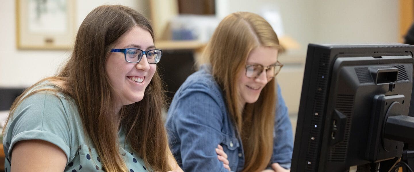 Students work in a computer lab