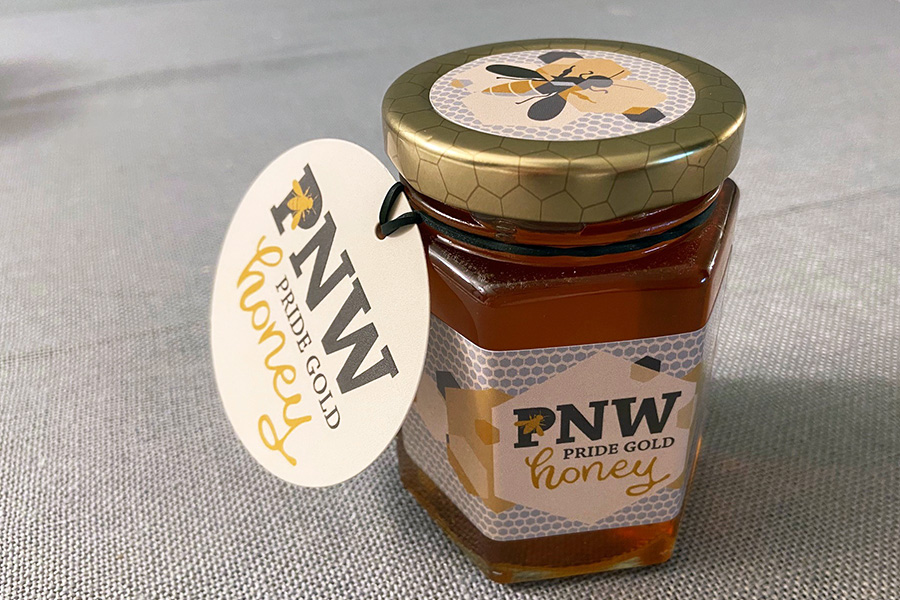 A jar of PNW Pride Gold Honey