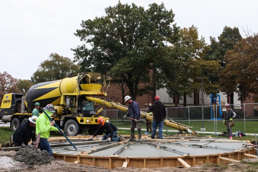 Cement was applied Nov. 9 for the base of a new bell tower on the Hammond campus. The structure will be located by the Student Union and Library Building, the Nils K. Nelson Bioscience Innovation Building, and Lawshe Hall.