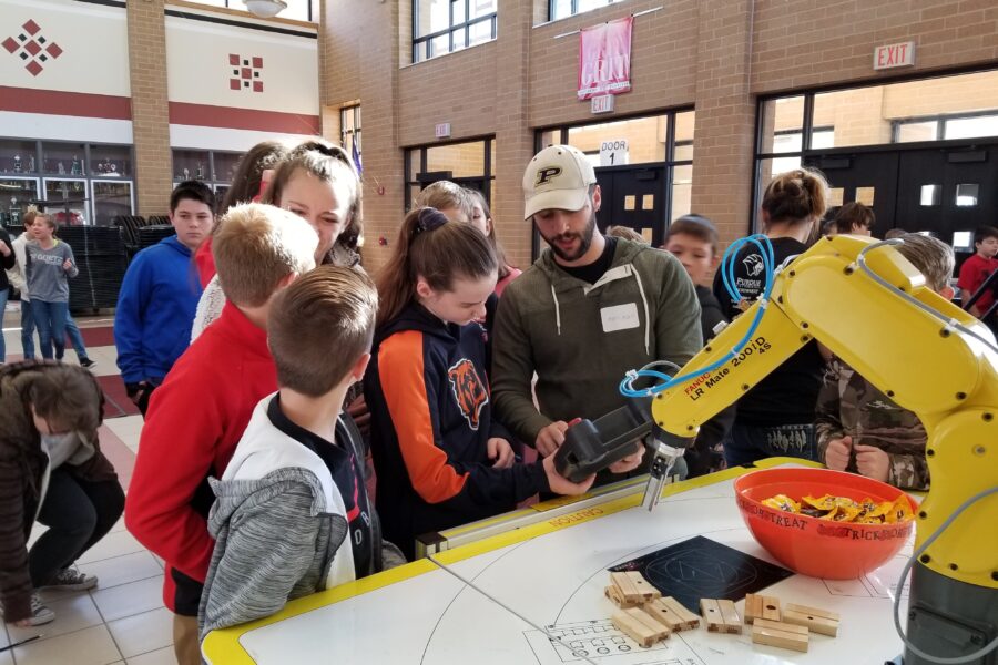 Stem students reviewing a project are pictured.