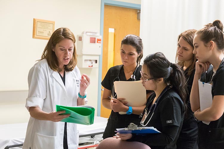 Purdue University Northwest nursing students listen to an instruction