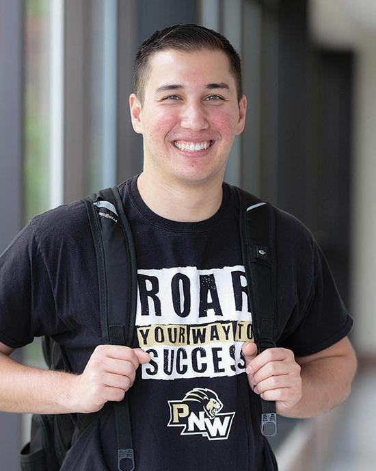 PNW student wearing a Roar Your Way to Success shirt in PNW's bachelor's degree program in Accounting