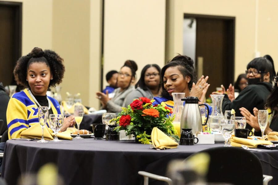 PNW’s Sigma Gamma Rho chapter applaud during William Godwin’s keynote address