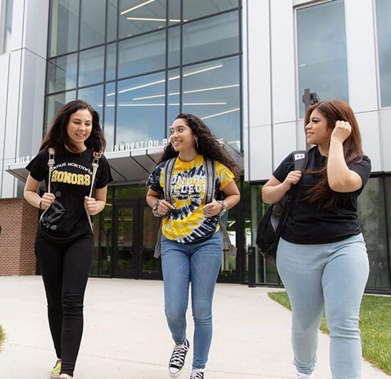 PNW students walk through campus