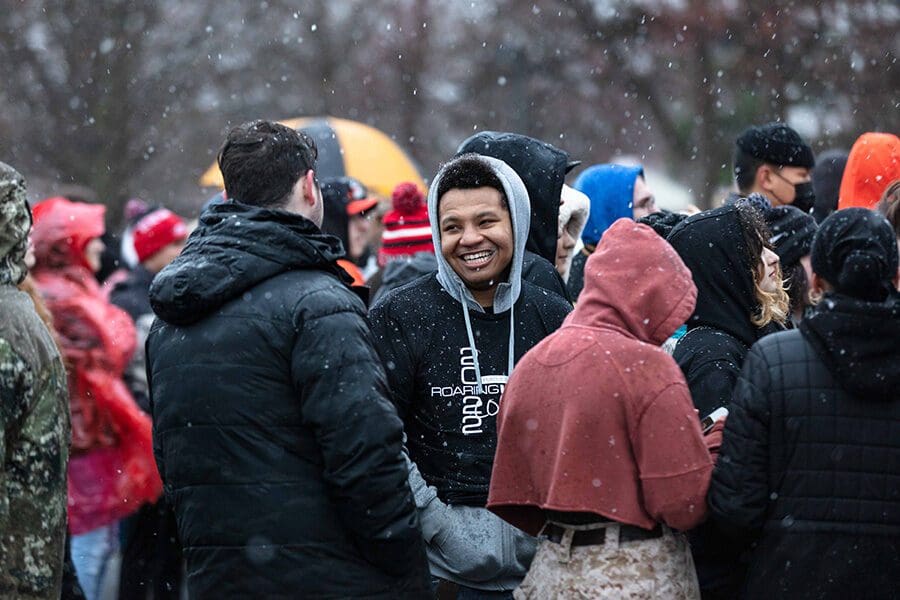 PNW students stand and smile