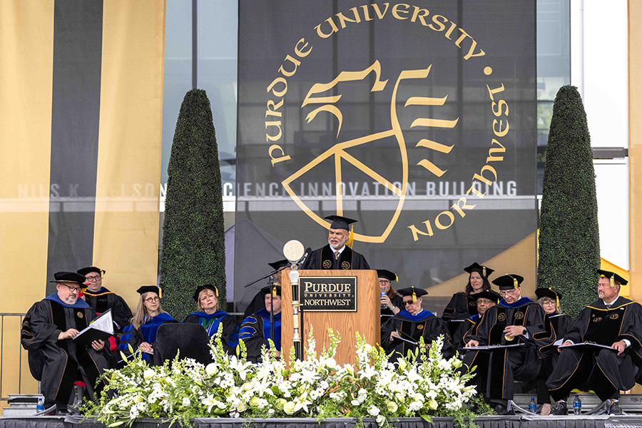 Al Sori addresses PNW's spring 2022 graduates from the stage.