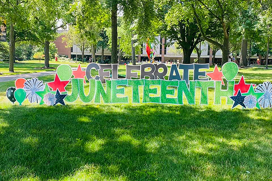 Yard sign reading "Celebrate Juneteeth"