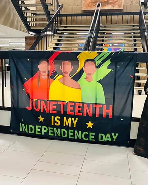 Flag featuring three people with the words "Juneteenth is my independence day"