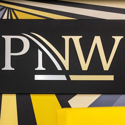 The PNW logo on a wall