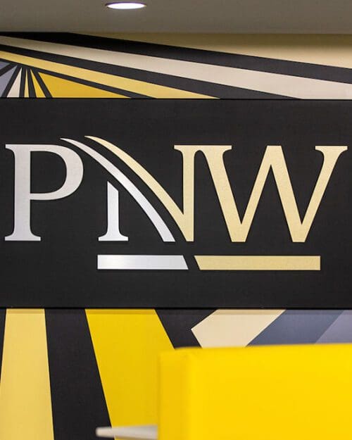 The PNW logo on a wall